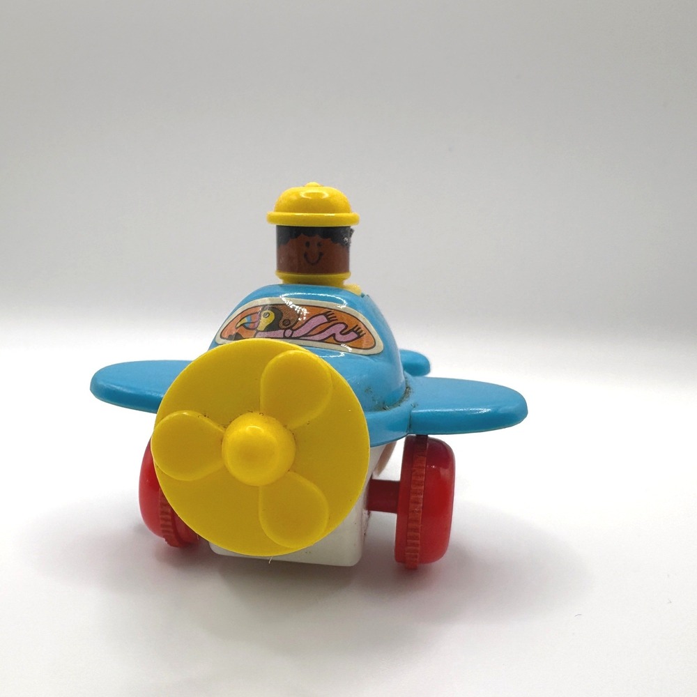 Vintage 1982 Tomy Blue White Plastic Wind Up Airplane Toy Red Wheels Propeller